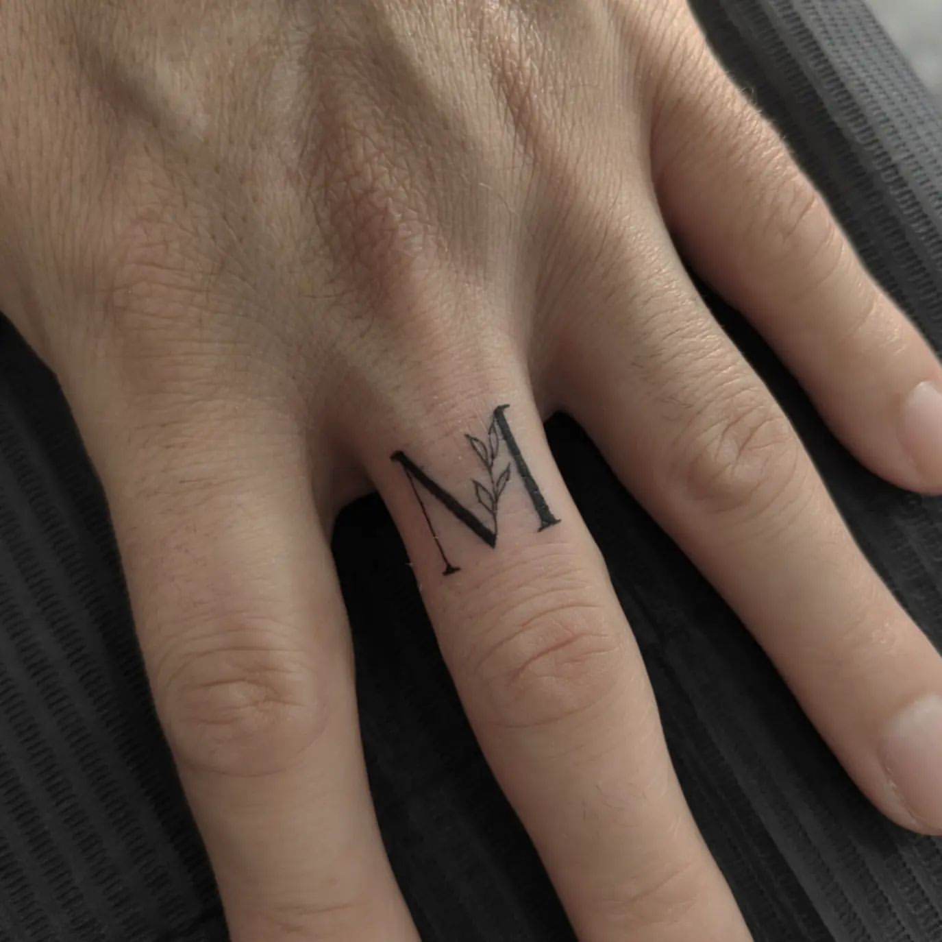 Finger Tattoos for Men 23